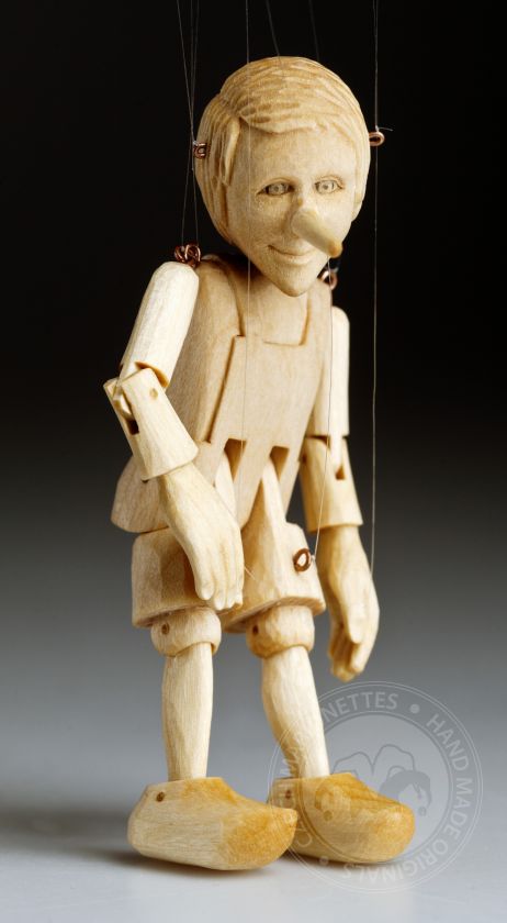 The smallest Pinocchio marionette in the world - precisely hand-carved from a linden wood