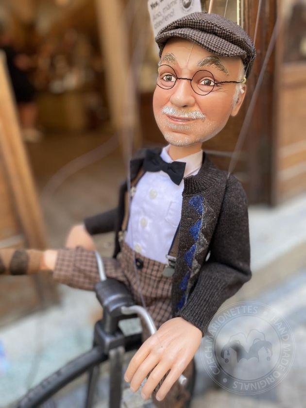 Man on a bike - custom made marionette of a velocipedist