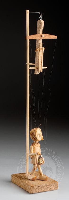 The smallest marionette in the world - a hand-carved wooden Ladybug