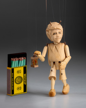 The smallest marionette in the world - a wooden hand-carved bug